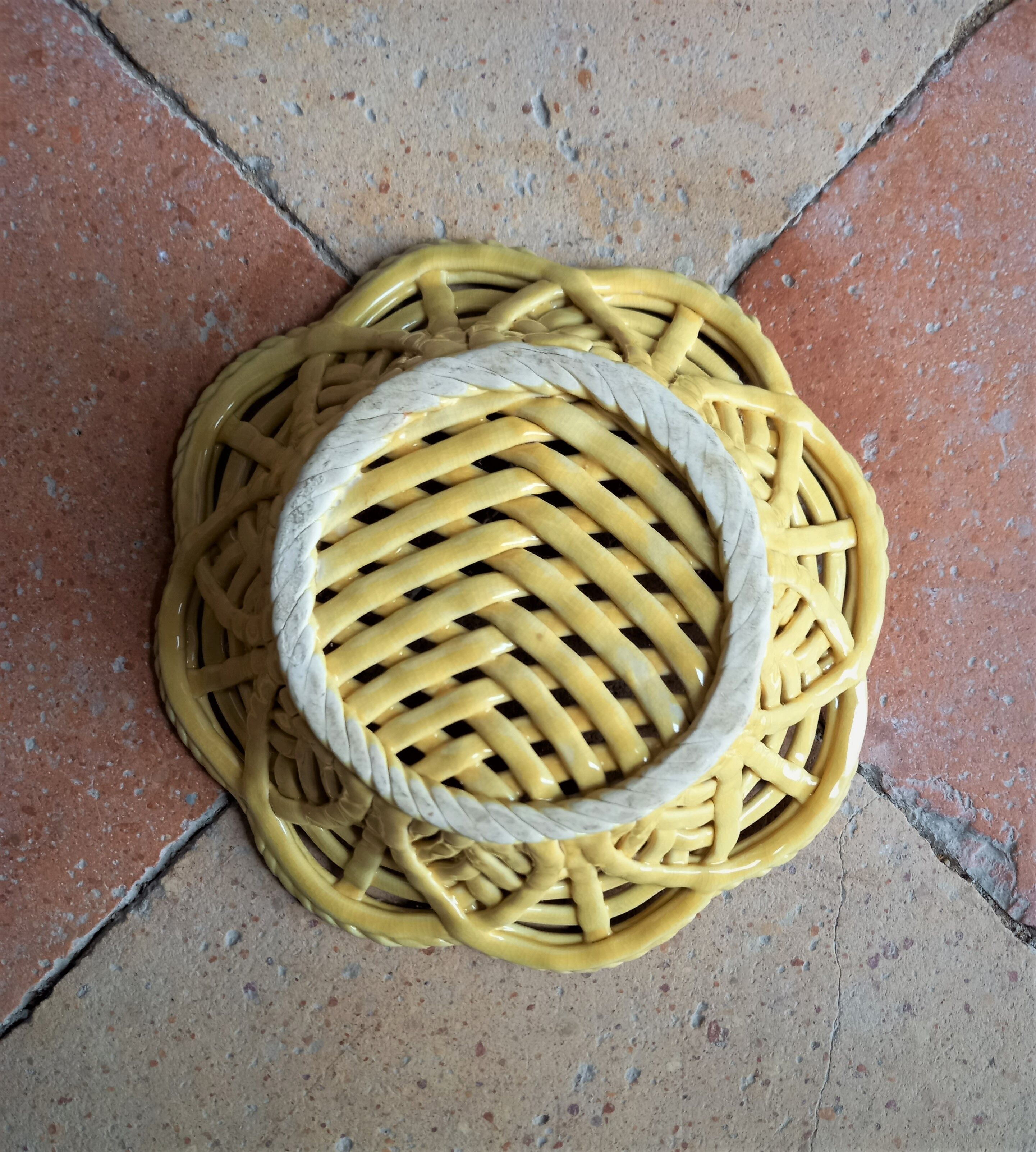 Yellow braided ceramic fruit basket