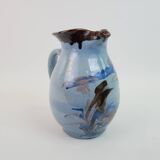 Large blue pitcher with abstract pattern