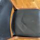 Vintage leather and wood chair pair