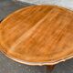Round extendable dining table Louis XV in solid wood from the 1960s.
