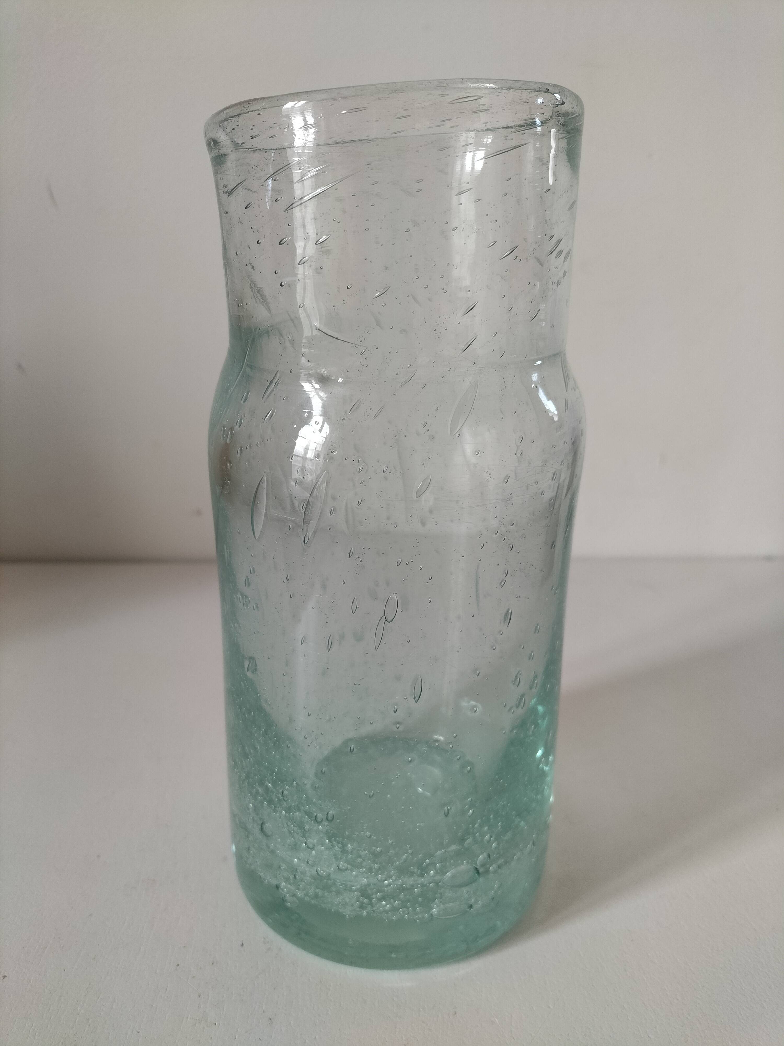 Vintage vase in very pale green bubbled glass, handcrafted