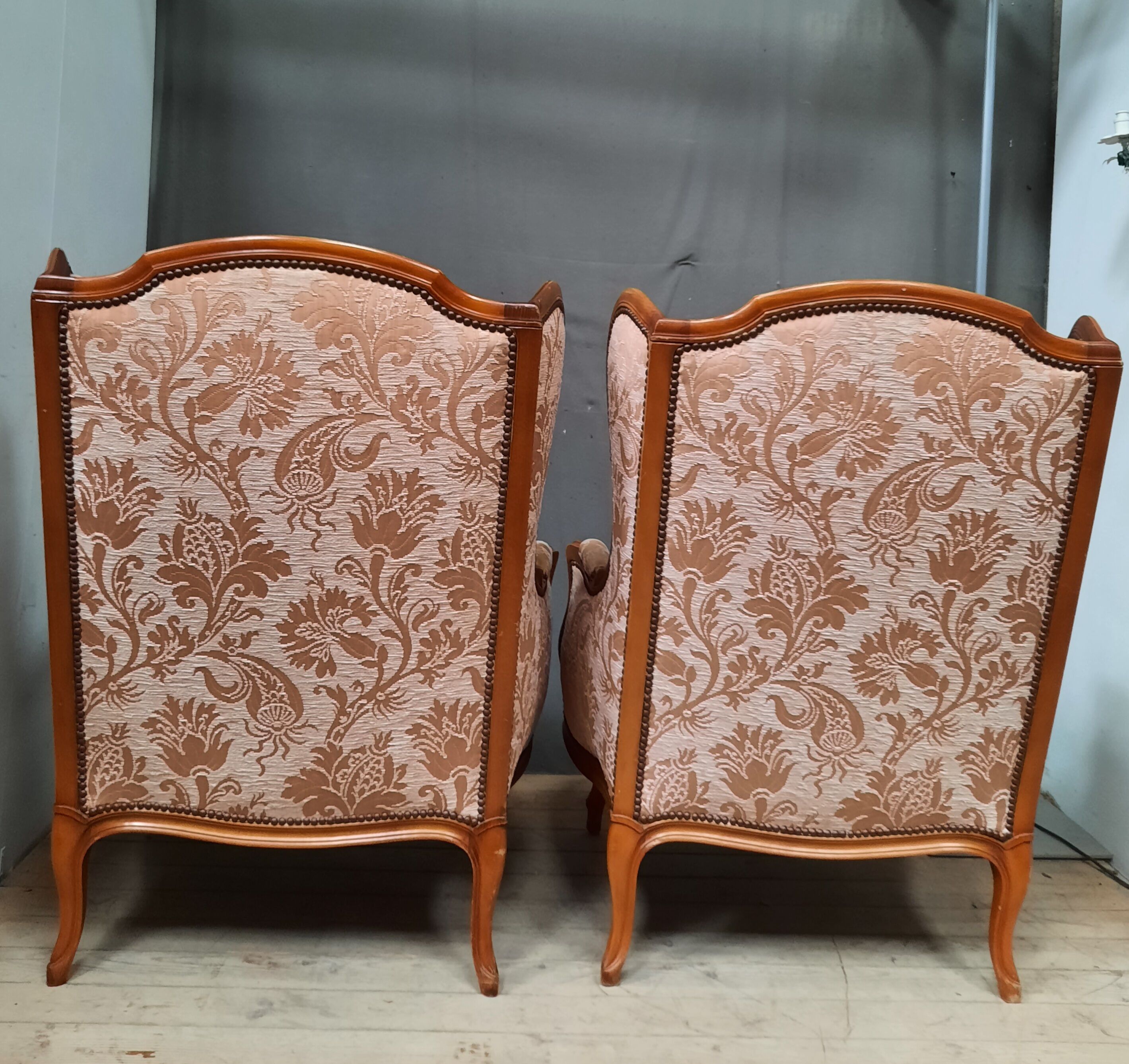 Pair of Louis XV style wing chairs