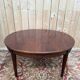 Extendable oval table in Louis XVI style – Mottled mahogany – 19th century