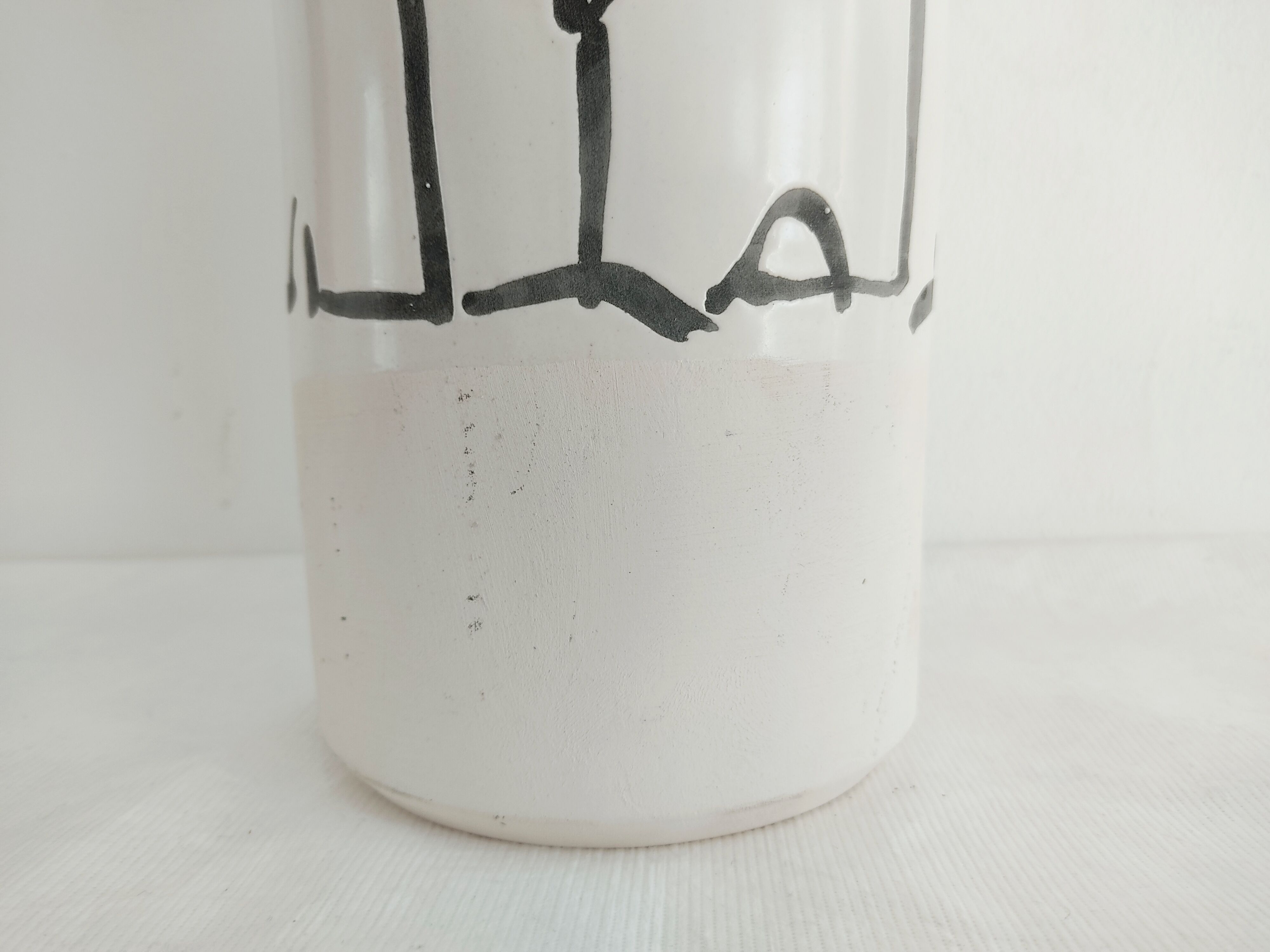 Vase decorated in hollows of bottles and glasses