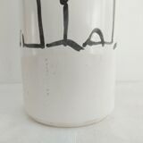 Vase decorated in hollows of bottles and glasses