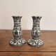 Pair of White and Black Porcelain Candle Holders with Berain Scroll Decoration, Baluster Style