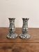 Pair of White and Black Porcelain Candle Holders with Berain Scroll Decoration, Baluster Style