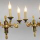 Pair of gold bronze wall lights in Empire style with three lights "Lucien Gau"