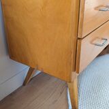 Vintage chest of drawers with tapered legs from the 1960s.