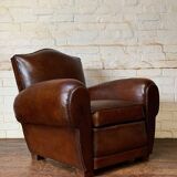 French leather club chair, chapeau de gendarme model, circa 1940