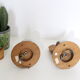 Duo of wooden appliques and tulip globe in scrambled glass, based on brass