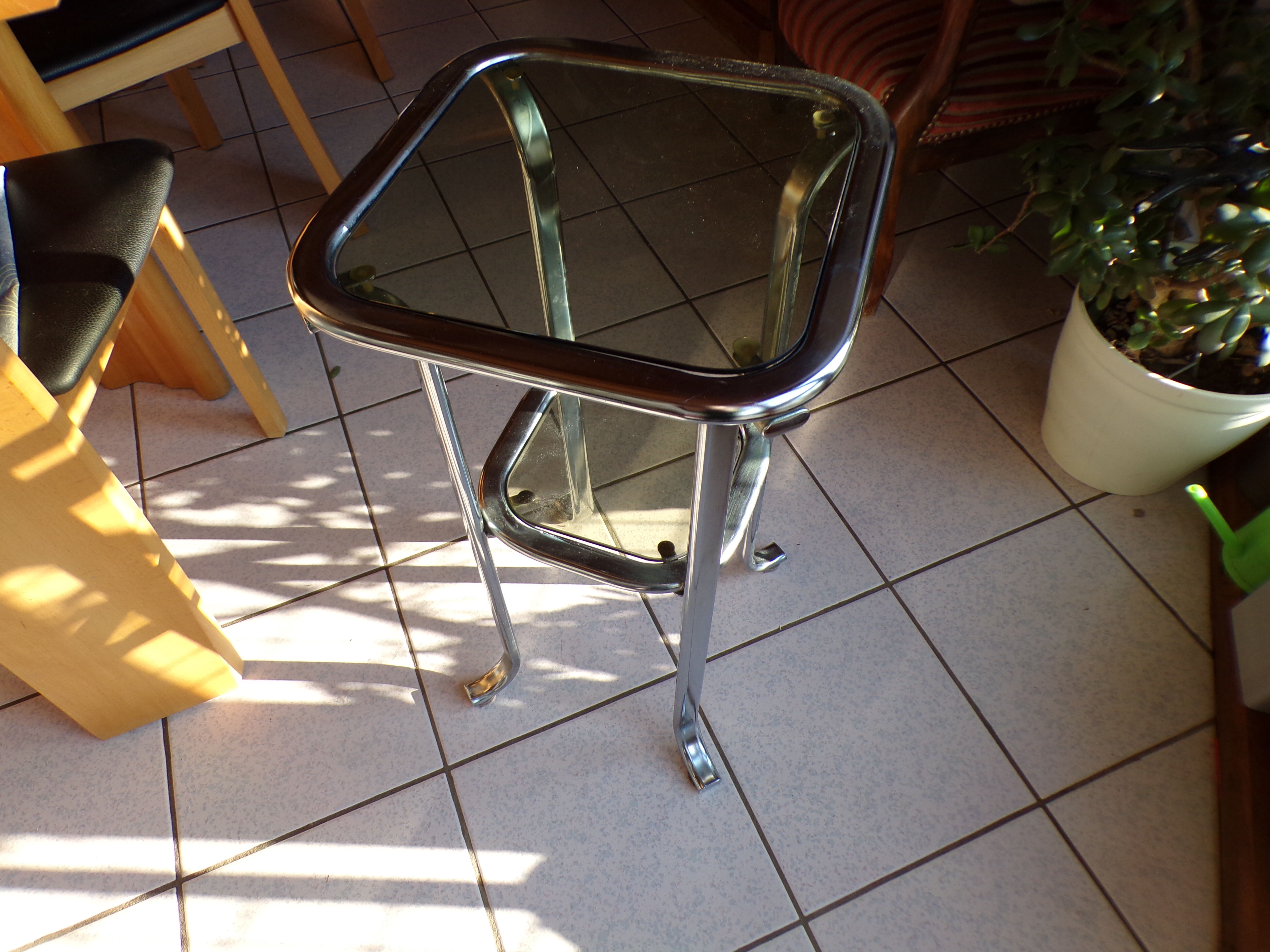Bedside table or end of tubular steel sofa