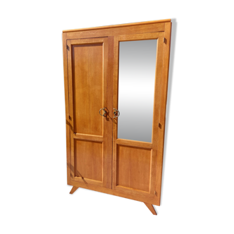 Vintage wardrobe with mirror and tapered legs.