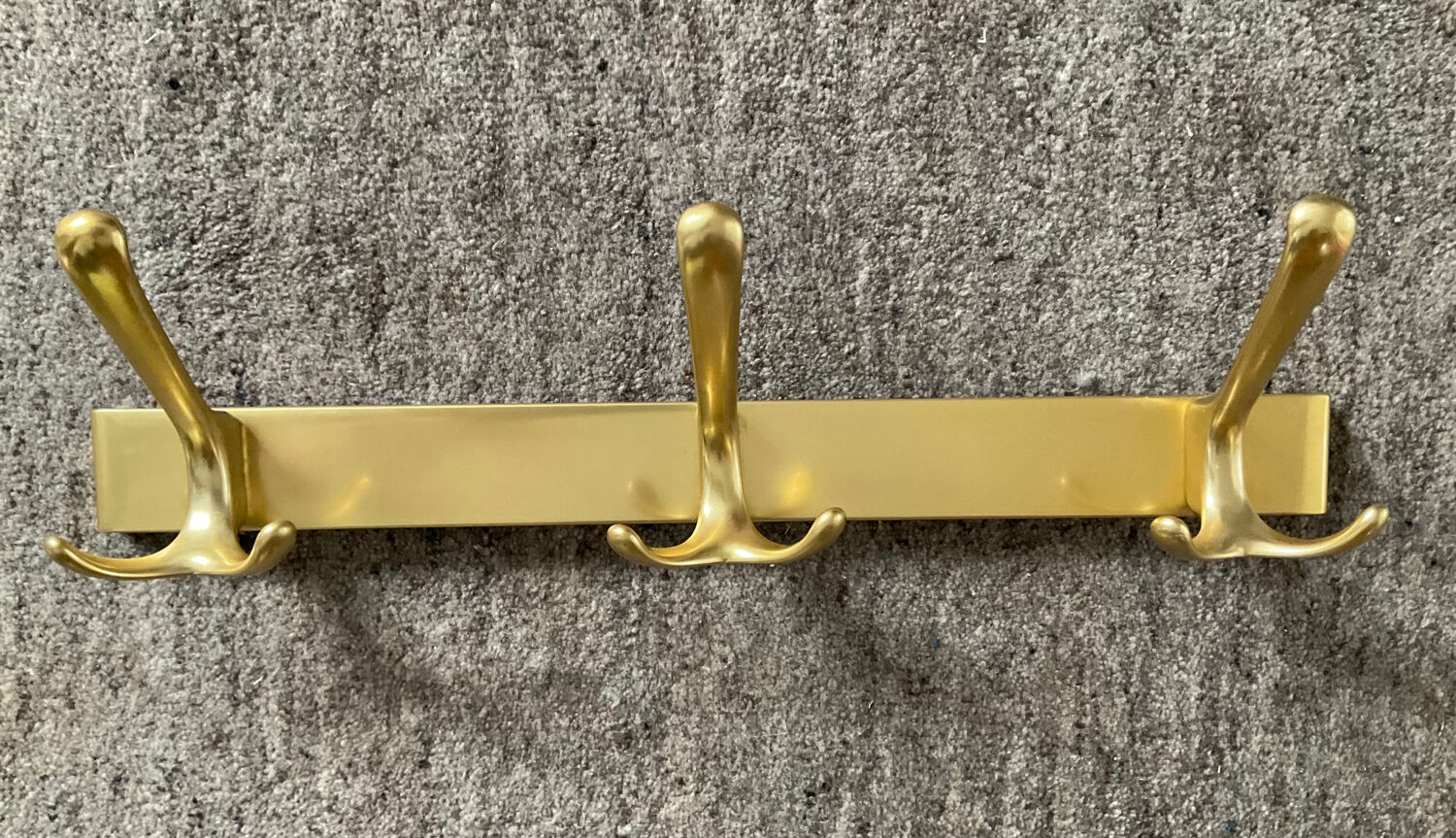 Vintage coat rack in gilded aluminum