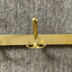 Vintage coat rack in gilded aluminum