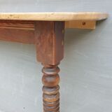 Console xixth walnut feet spinning tops