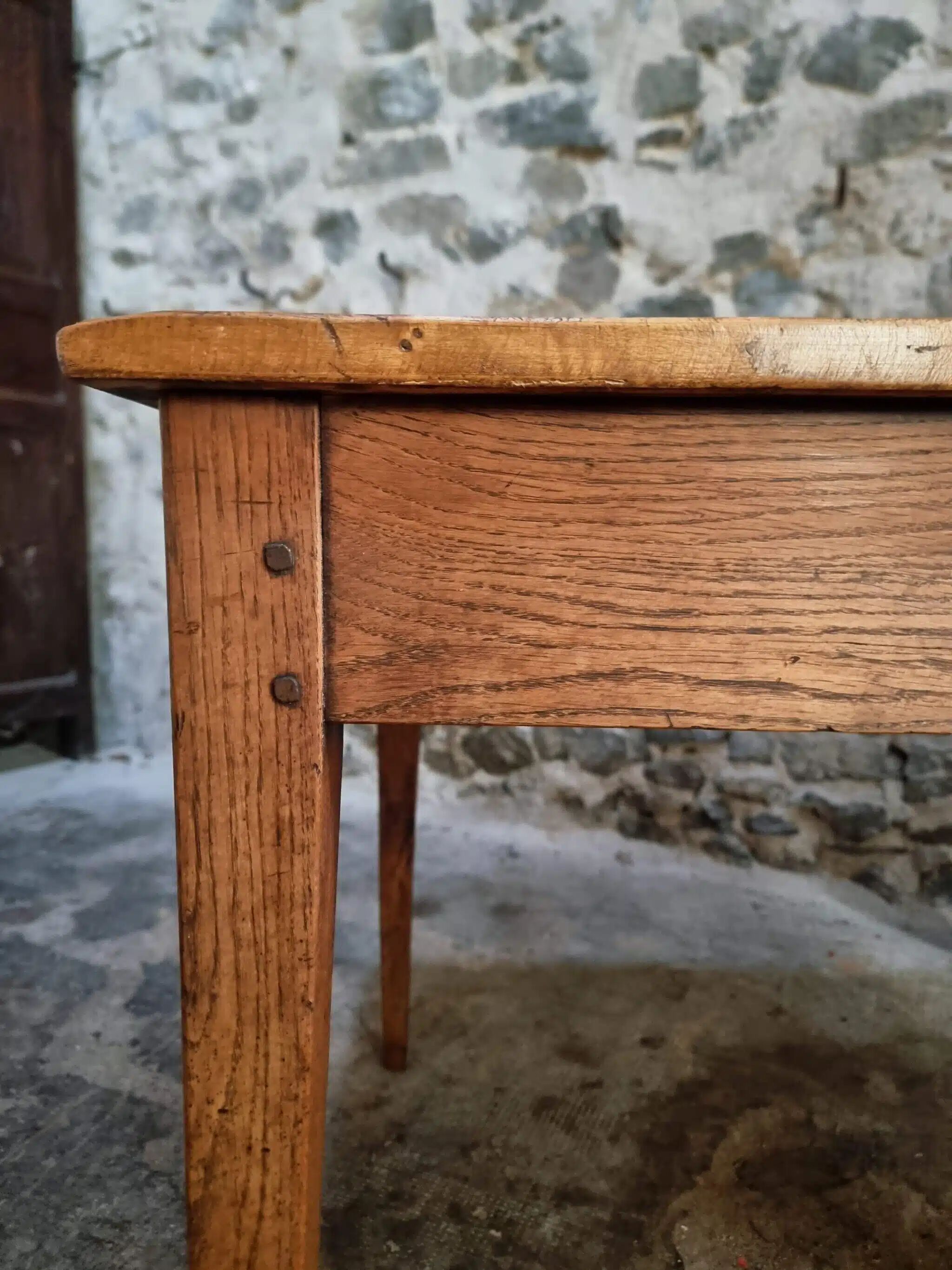 Antique French dining table with drawer, around 1900.