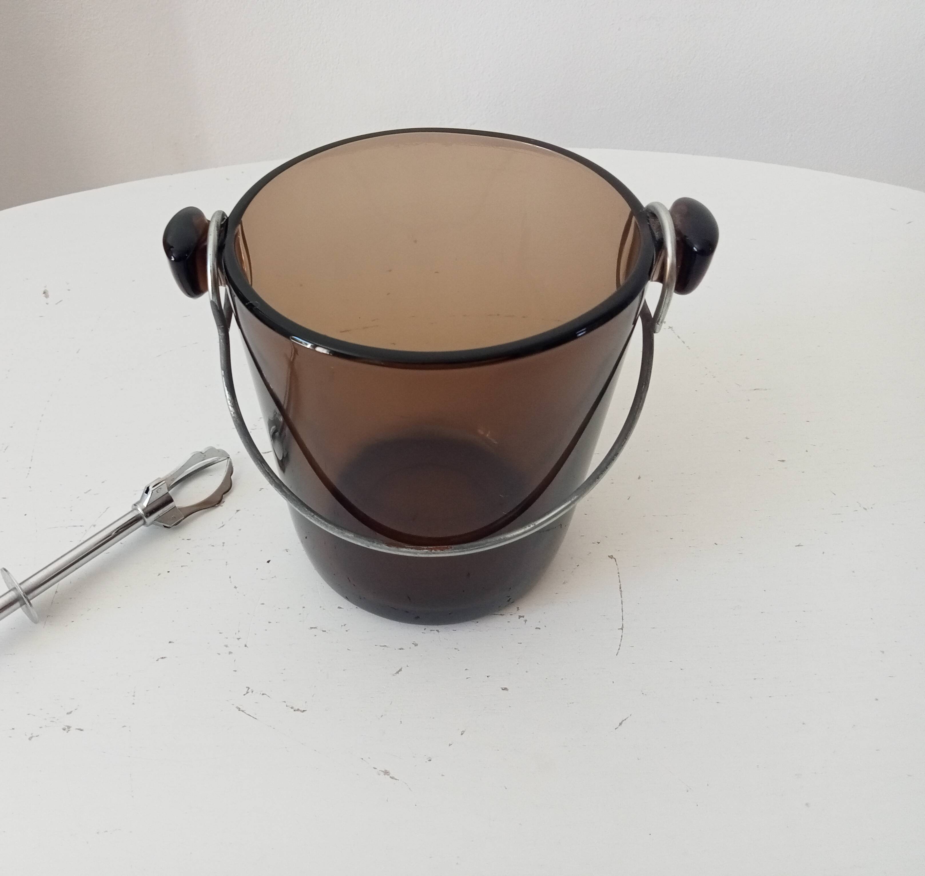 Vintage 1970s ice bucket and tongs.