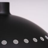 Matte black metal lamp signed by hand by its creator Marc Held