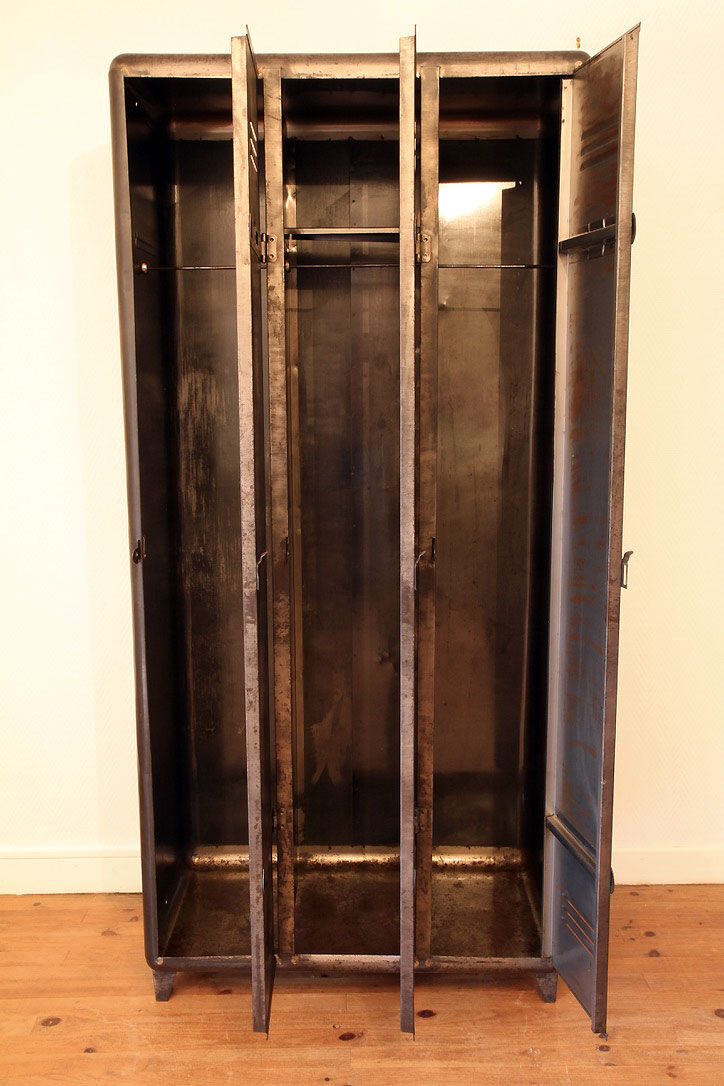 Industrial metal cloakroom with rounded corners.