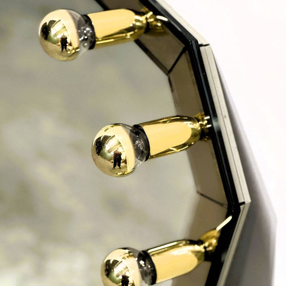 Vintage German brass & smoked mirror with architectural faceted top, 1980s.