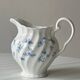 White porcelain creamer with small blue flowers – Milk jug