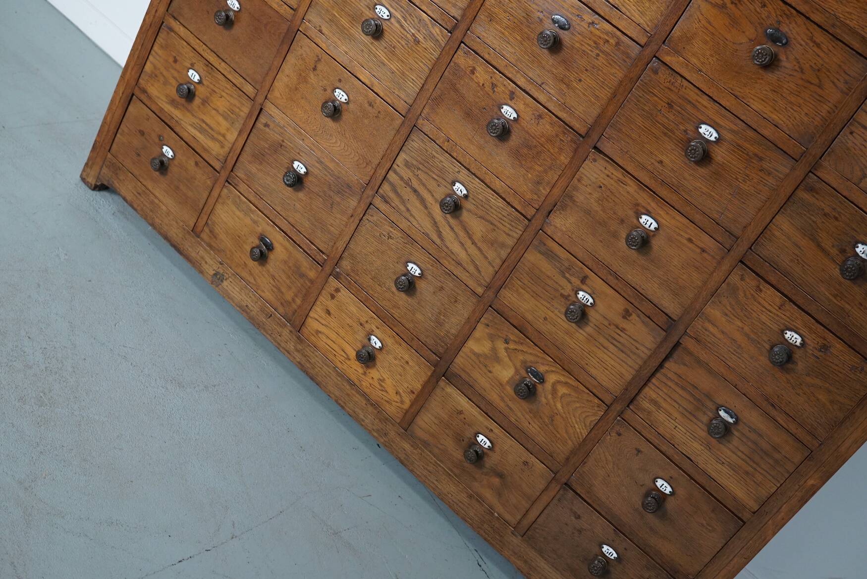 Large dutch oak apothecary cabinet / barber cabinet with enamel shields, 1900s