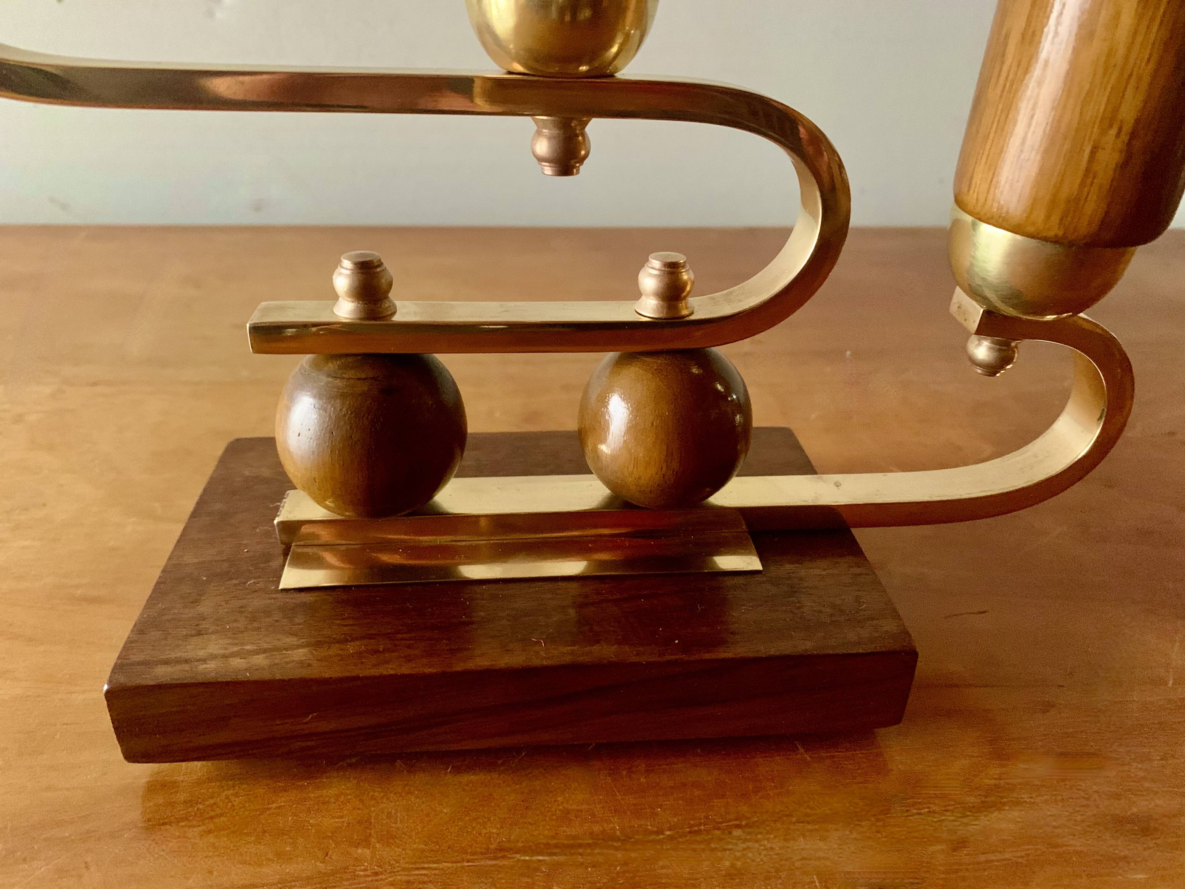 Pair of Art Deco candlesticks in gilded brass and wood