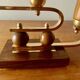 Pair of Art Deco candlesticks in gilded brass and wood
