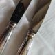 Stainless steel knives and silver metal
