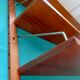 Wall shelving system and teak writing box. of Poul Cadovius. Denmark 1960