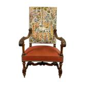 Old wooden-style armchair and unicorn décor fabric