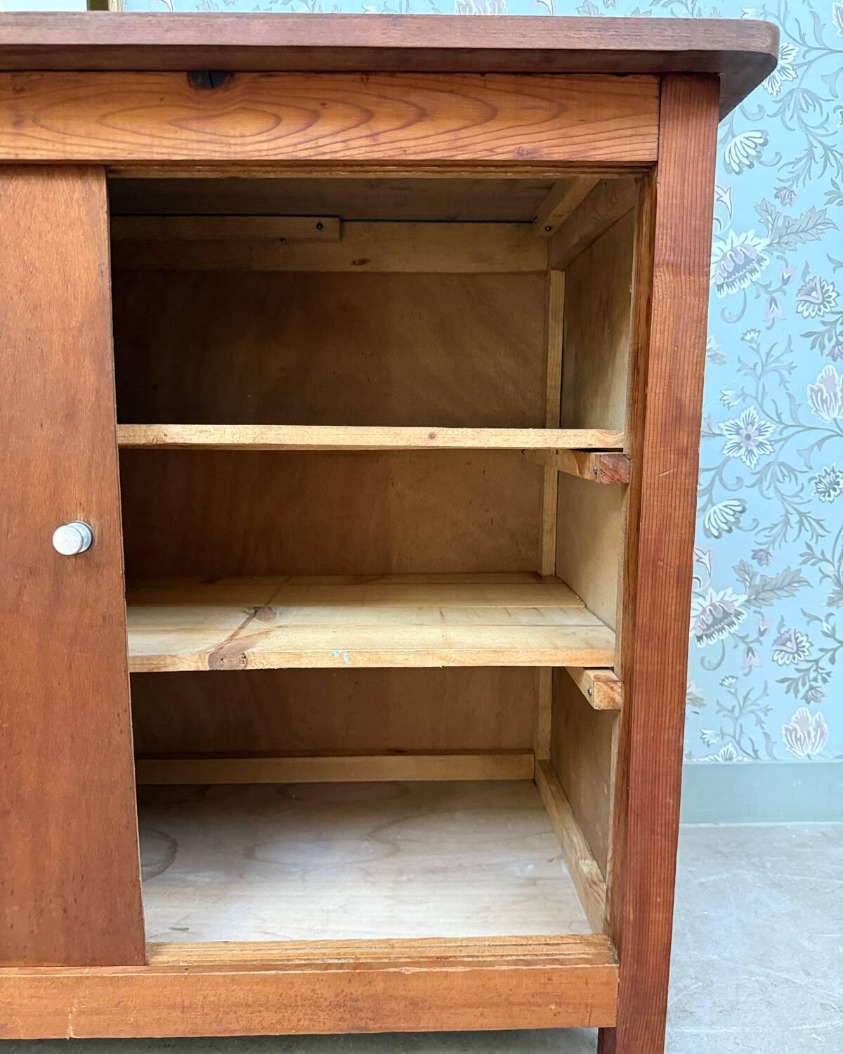 Vintage sideboard with sliding doors