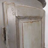 Rustic patinated corner cupboard