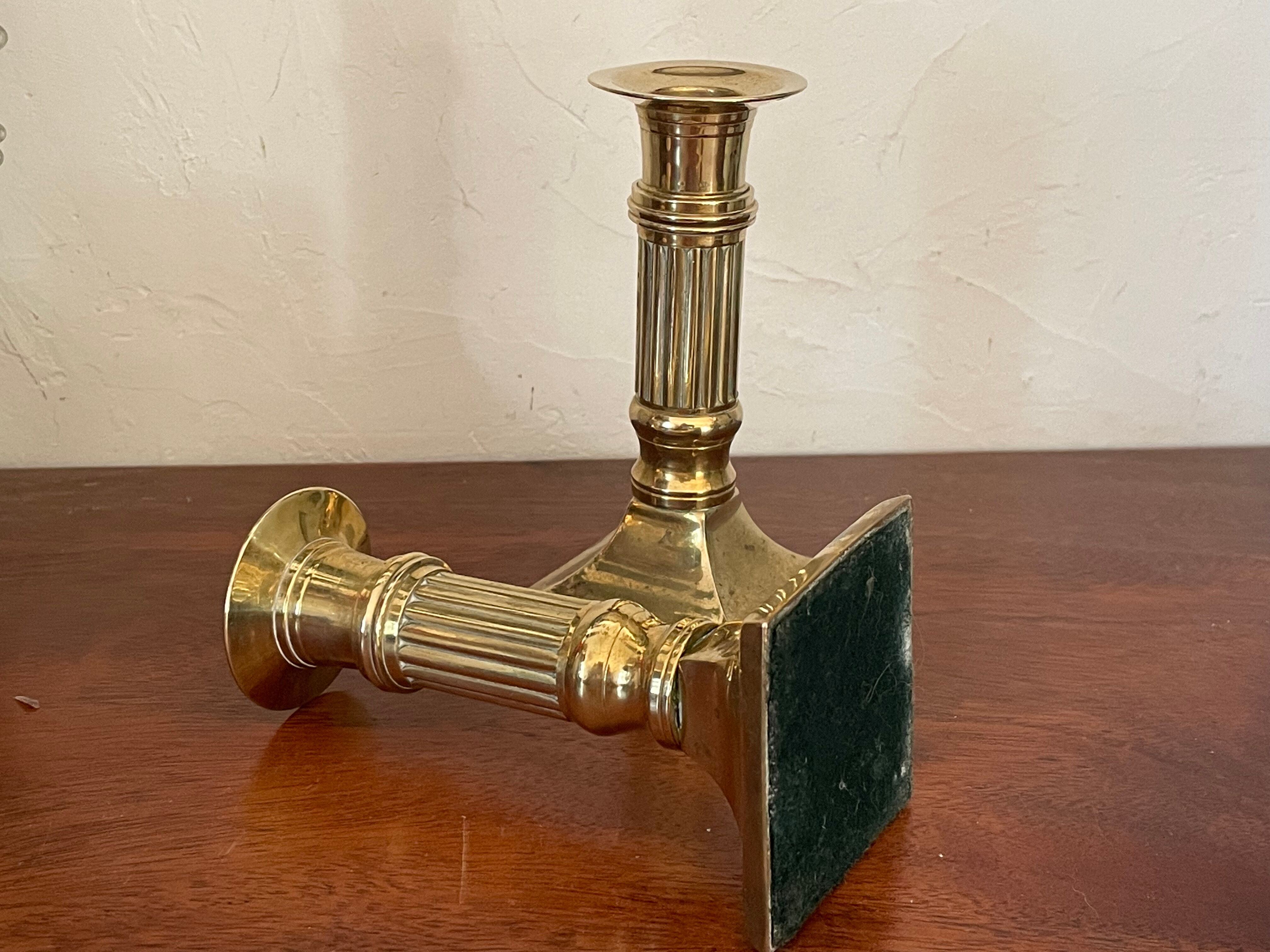Pair of brass column candle holders