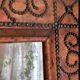 Antique mirror designed by "Pierre Lottier". Leather and nails. France 1