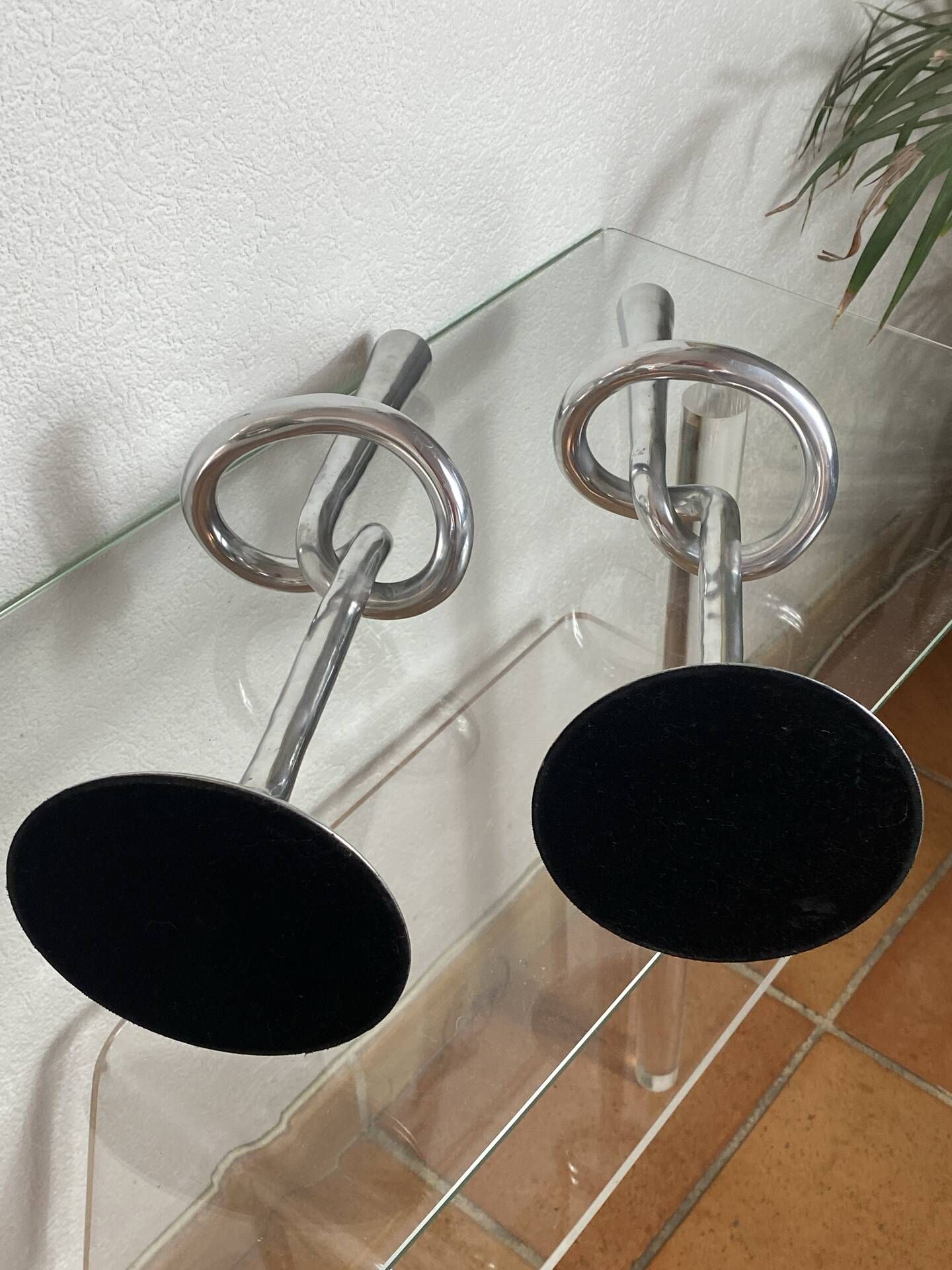 Pair of large aluminium bow candlesticks, Italy, 1970.