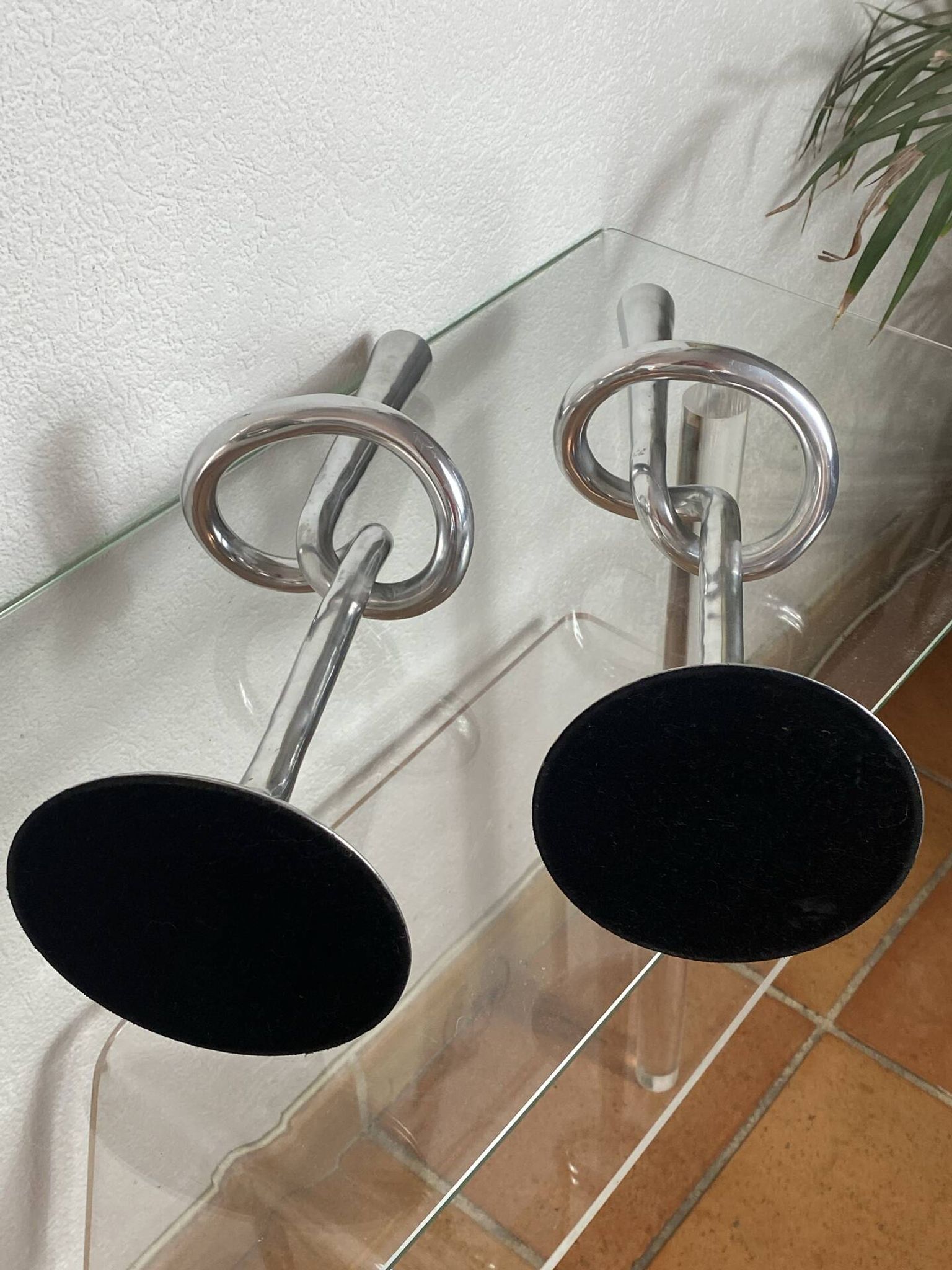 Pair of large aluminium bow candlesticks, Italy, 1970.