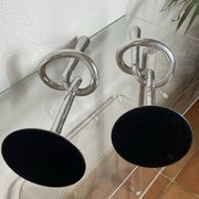 Pair of large aluminium bow candlesticks, Italy, 1970.