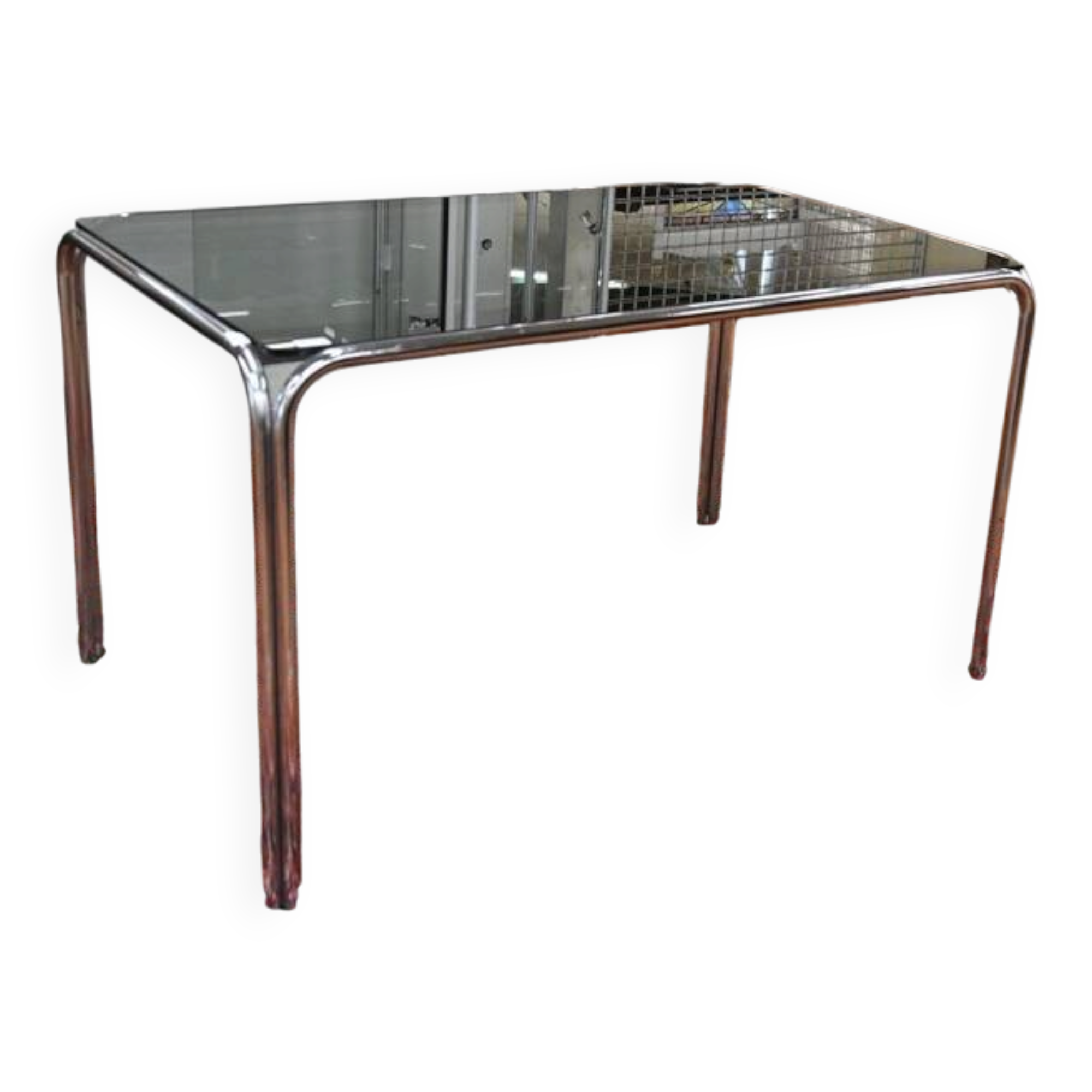 Vintage glass dining table with chrome legs.