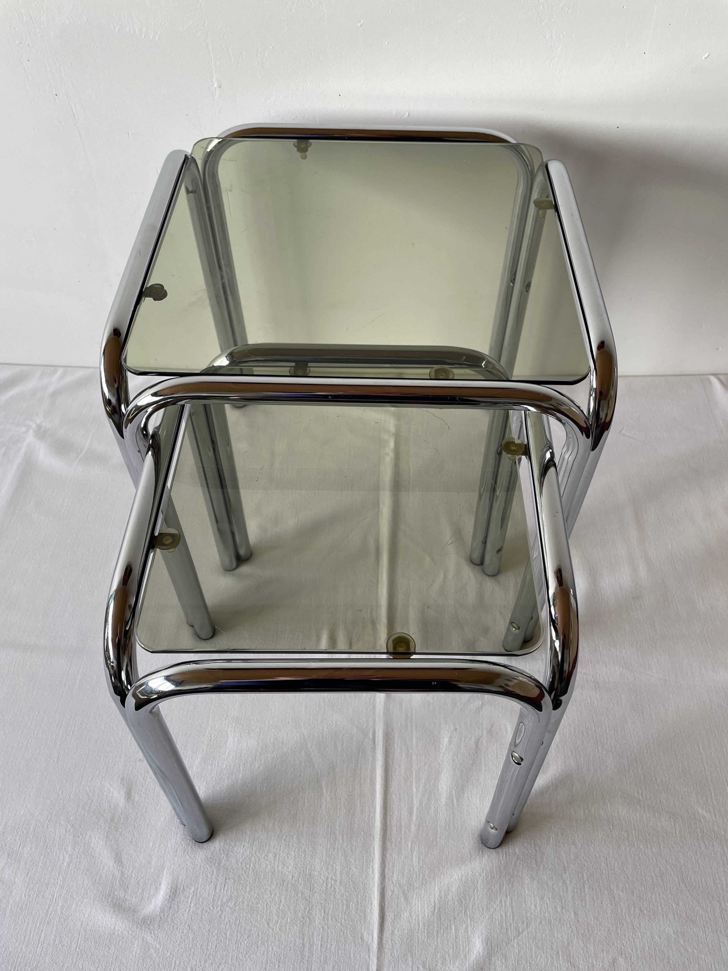 Chrome and smoked glass nesting tables, 1970s