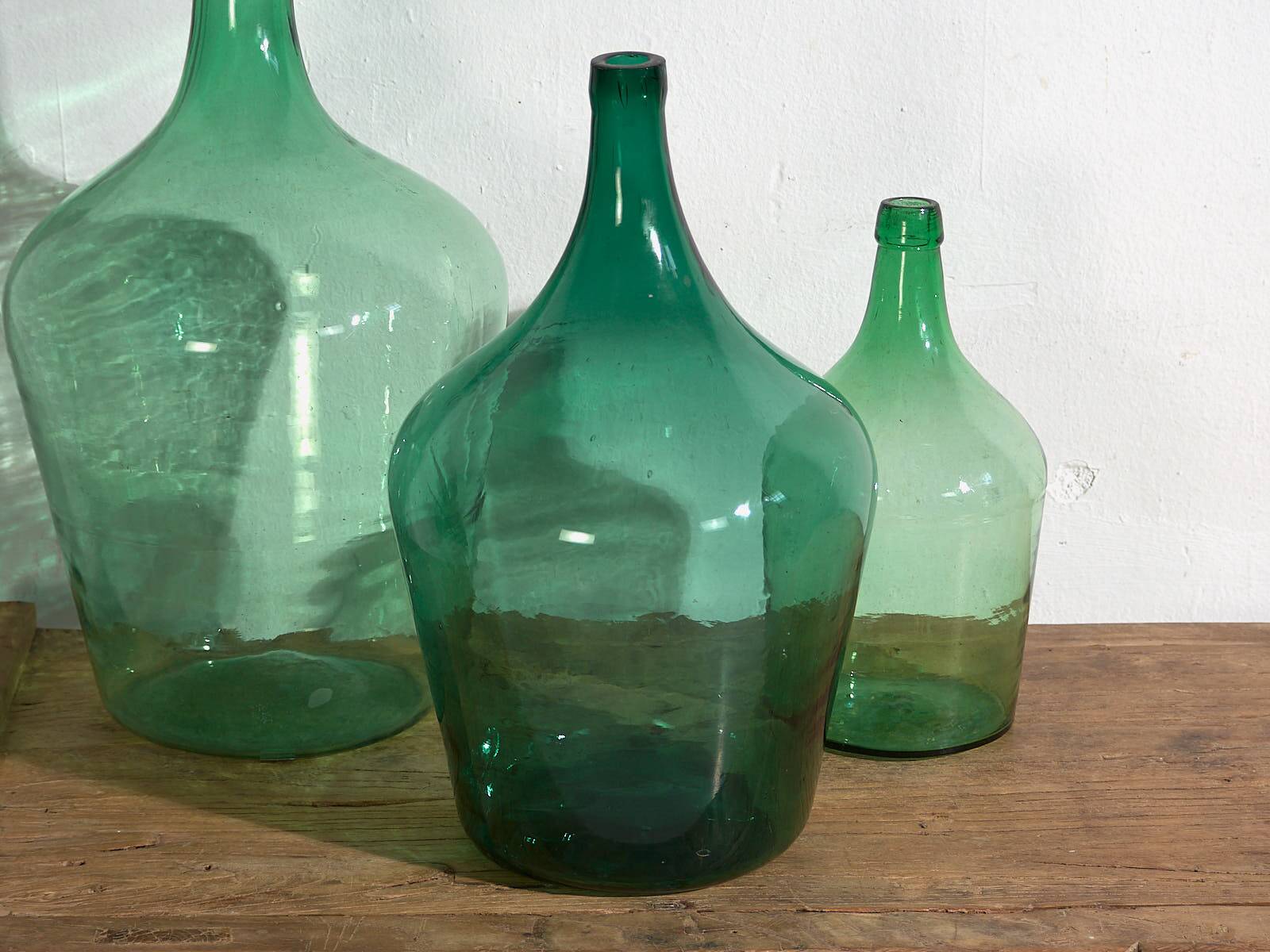 Antique green demijohns (c.1920). 3-piece set #6