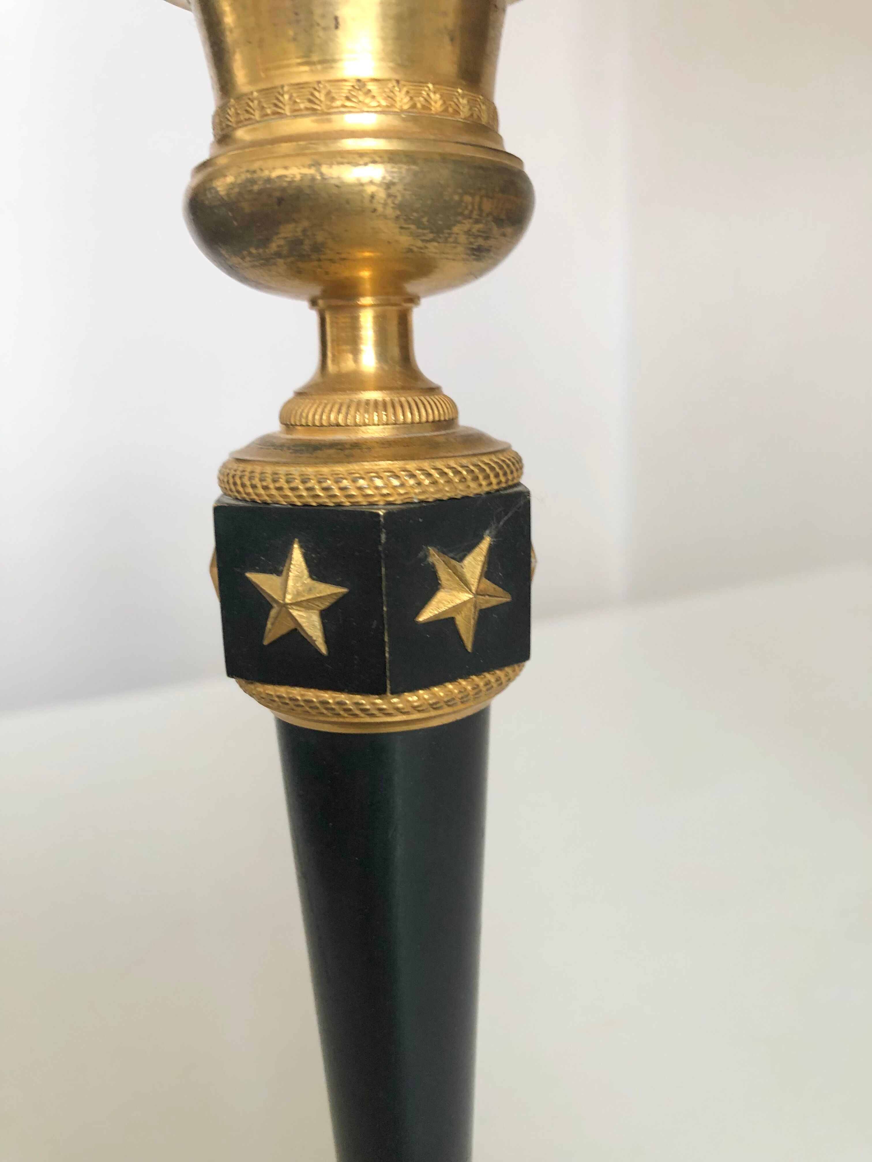 Pair of bronze candle holders empire era