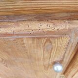 Vintage wooden buffet with a marble top.