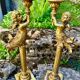 Pair of large candlesticks with cherubs