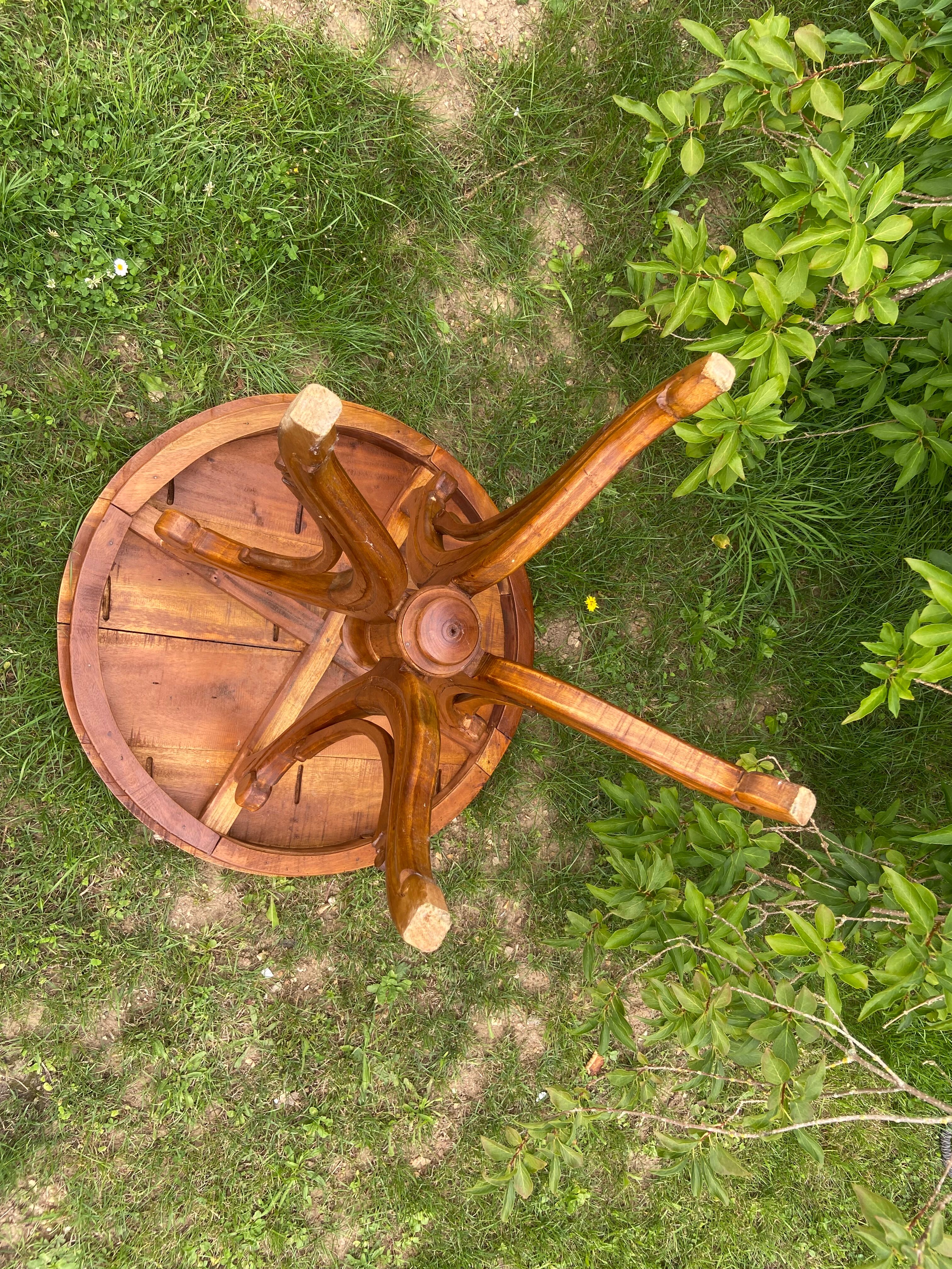 Round table and wrought iron chair
