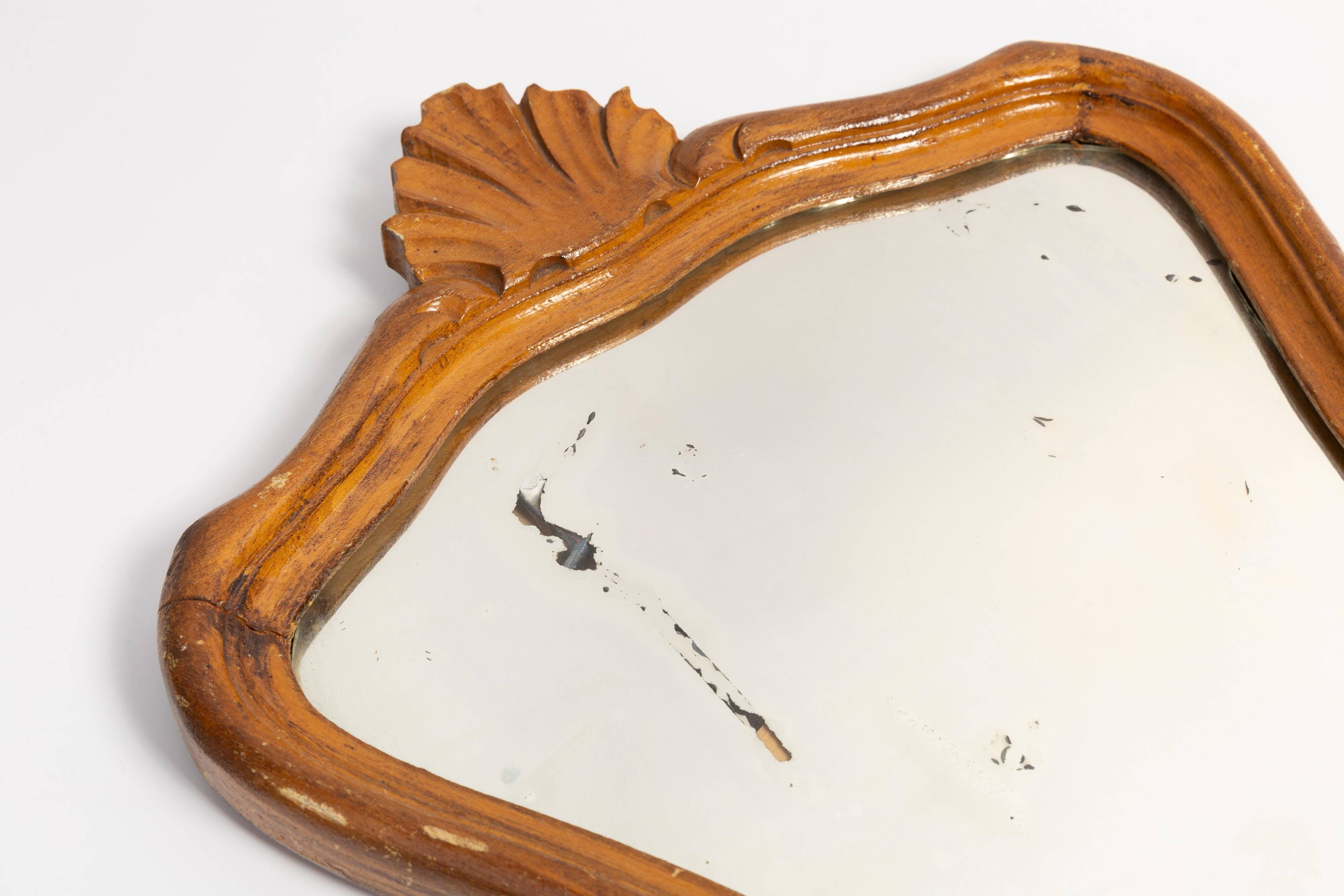 Pair of vintage Mid-Century decorative mirrors in a gold frame, Italy, 1960s.