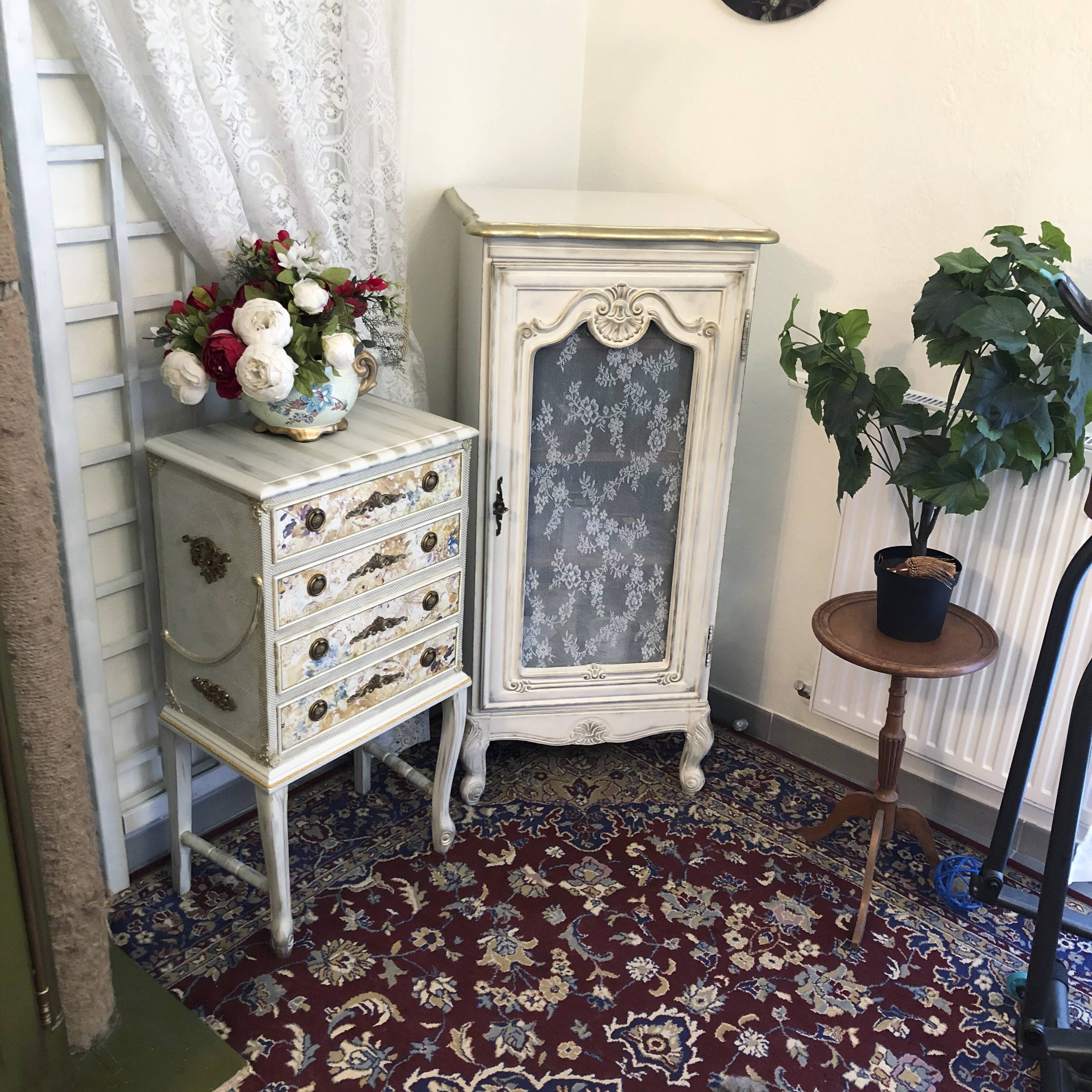 Vintage commode refurbished with 4 drawers in classic style with floral decor.