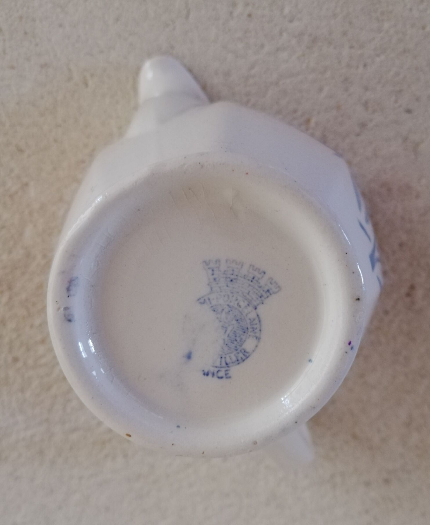 Badonviller iron earth milk jug