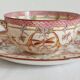 Tasse à café en terre de fer décor Minton rose Sarreguemines fin XIXe